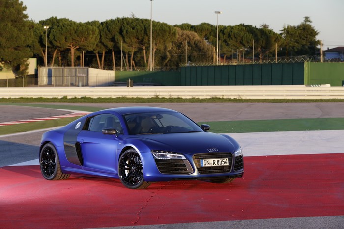 Blue Audi R8 V10 plus on a race track