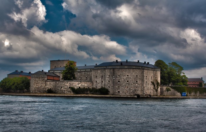 Vaxholm Castle, Sweden, under dramatic clouds