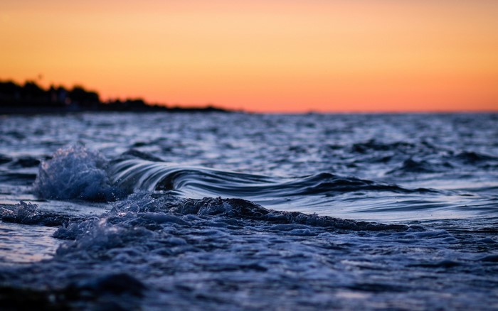 Ocean waves at sunset