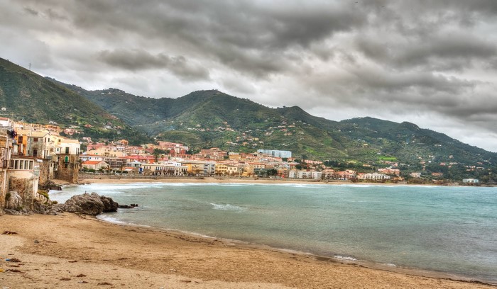 Cefalu, Italy Coastline with Beach and Mountains