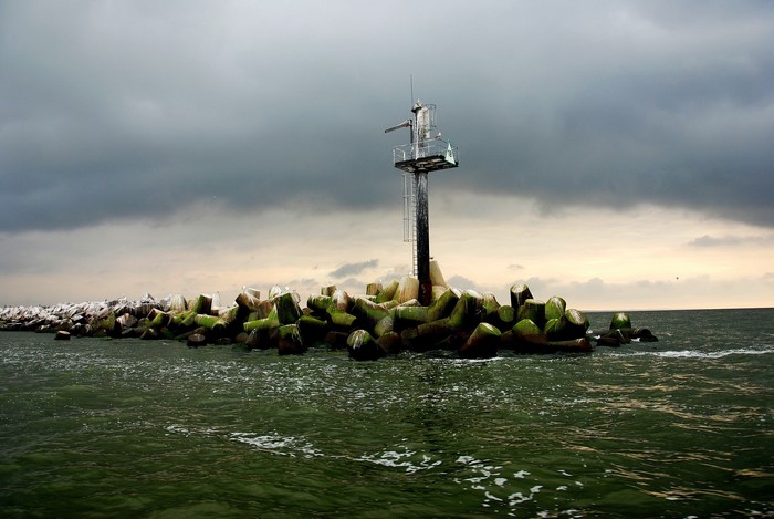 Lighthouse on a breakwater in Lithuania