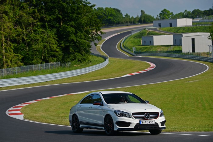 White Mercedes-Benz CLA 45 AMG Edition on a Race Track