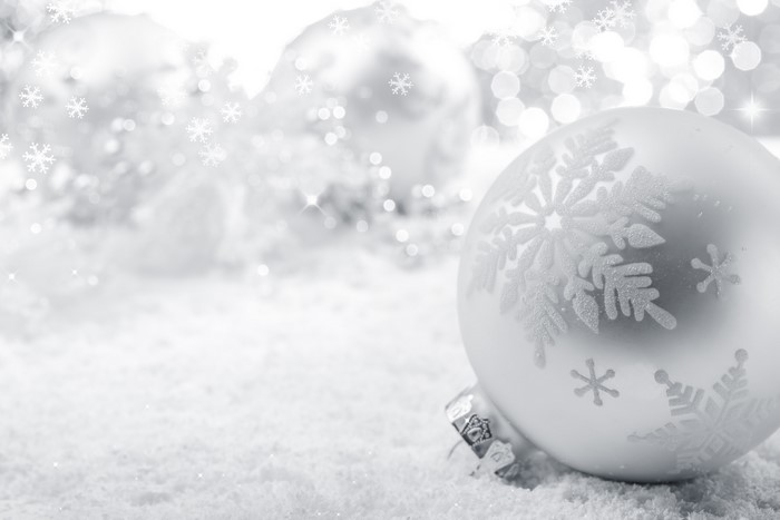 Christmas ornaments with snowflakes on snow