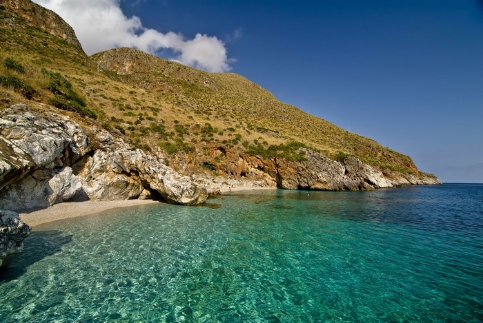 Rocky Coastline with Clear Turquoise Water in Trapani, Italy