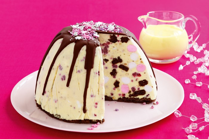 Ice cream cake with chocolate drizzle and sprinkles