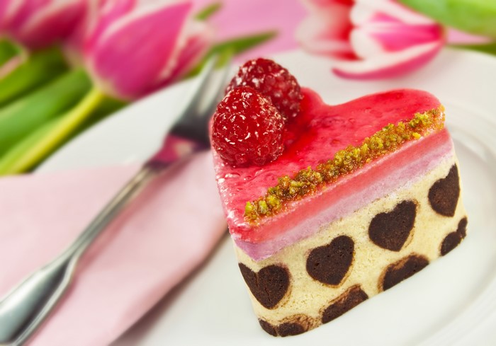 Heart-shaped raspberry cake with tulips