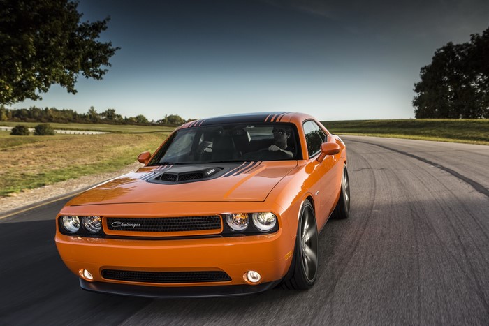 Orange 2013 Dodge Challenger Shaker on a Road