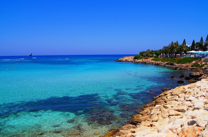Crystal clear turquoise sea and rocky coast in Cyprus