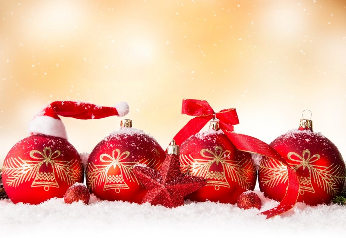 Christmas ornaments with Santa hat and ribbons
