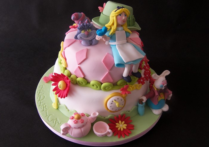 Alice in Wonderland themed cake with characters