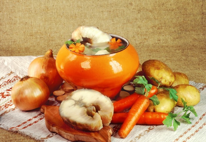 Fish soup with potatoes, carrots, and onions