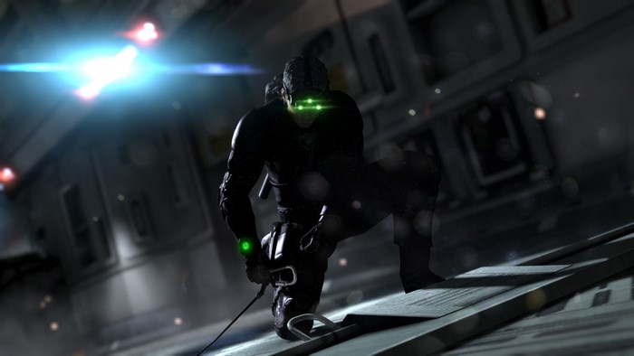 Sam Fisher from Splinter Cell crouches