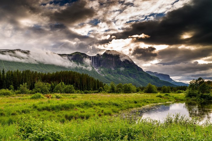 Waterfall cascading down a mountain in Hemsedal, Norway