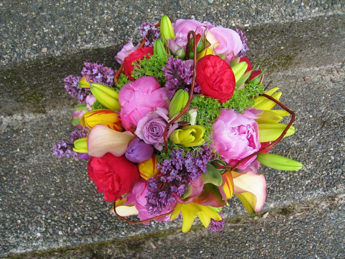 Colorful bouquet of flowers on a textured surface