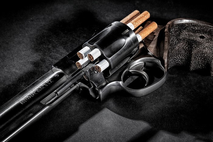 Revolver loaded with cigarettes