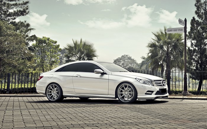 White Mercedes-Benz E-Class Coupe on Paved Road