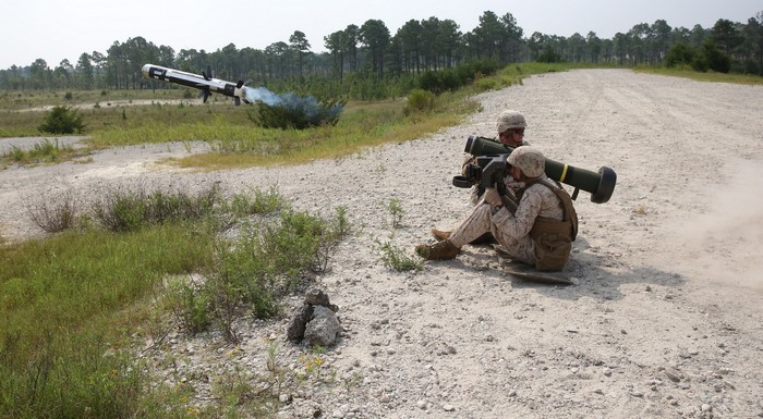 Soldiers firing a missile launcher