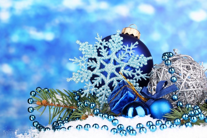 Christmas ornaments and snowflake on snow