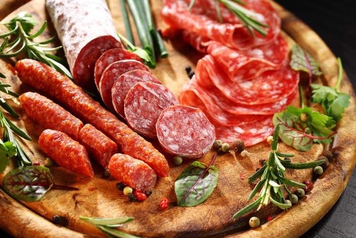Sausage platter with herbs and spices