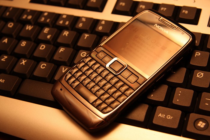 Nokia E71 phone on a keyboard