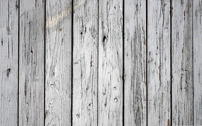 Weathered white wooden planks texture