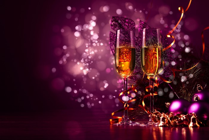Champagne glasses with Christmas decorations