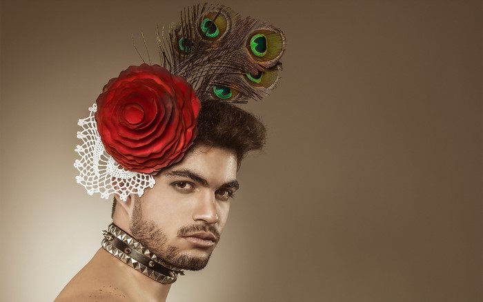 Man with Red Rose and Peacock Feather Headpiece