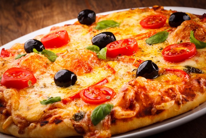 Pizza with tomatoes and olives