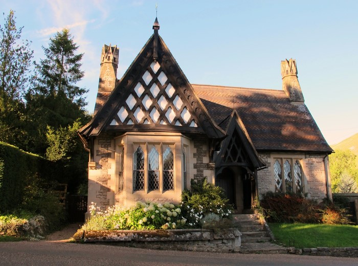 Stone cottage with diamond-patterned gable in Staffordshire, England