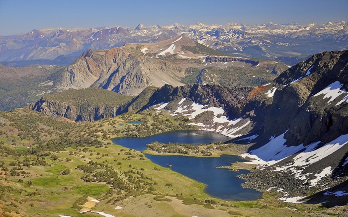Mountain landscape with lakes and snow-capped peaks
