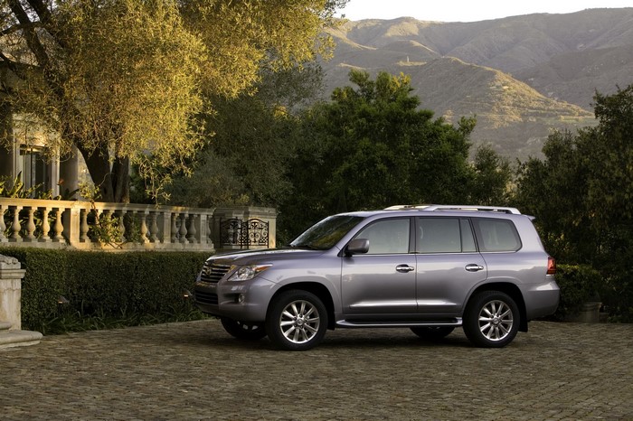 2008 Lexus LX570 parked in front of a mansion