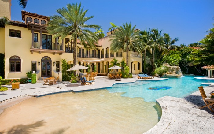 Luxury villa with pool and palm trees