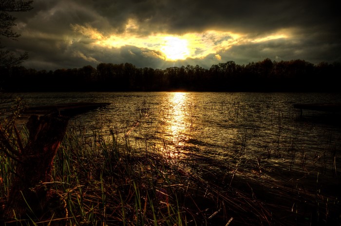 Sunset over a lake in Dadaj, Poland