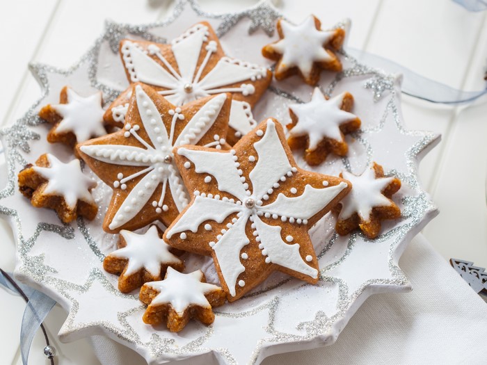 Star-shaped Christmas cookies with white icing