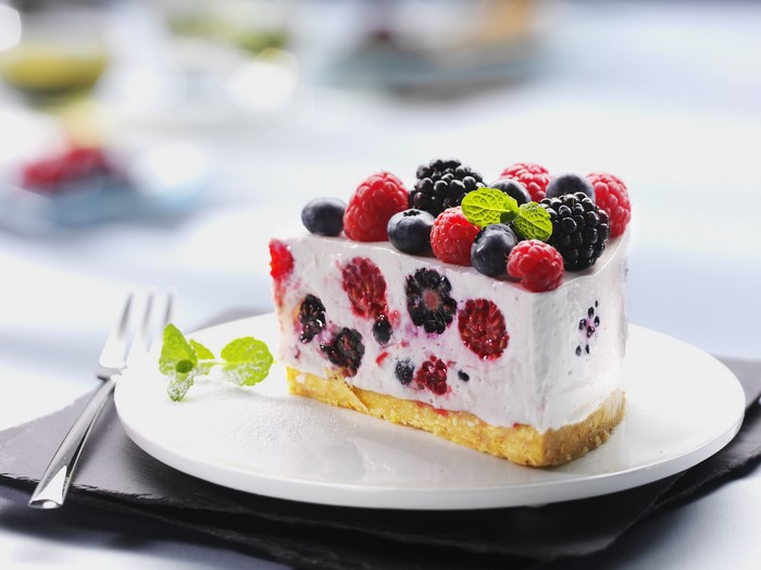Berry Cheesecake Slice with Mint and Fork