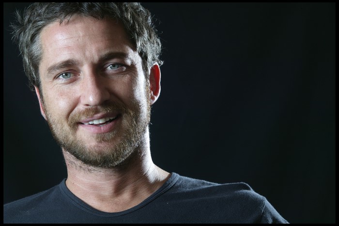 Gerard Butler with beard and blue eyes