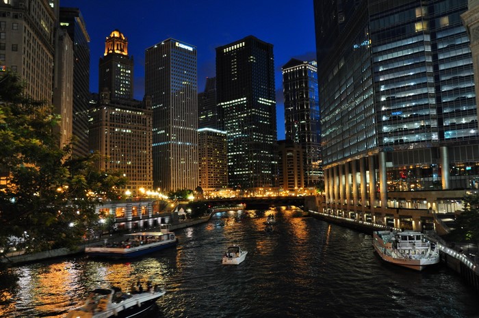 Chicago River at Night with Skyscrapers and Boats