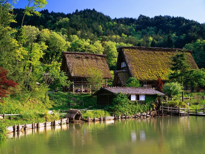 Traditional Japanese Gassho-zukuri houses by a lake
