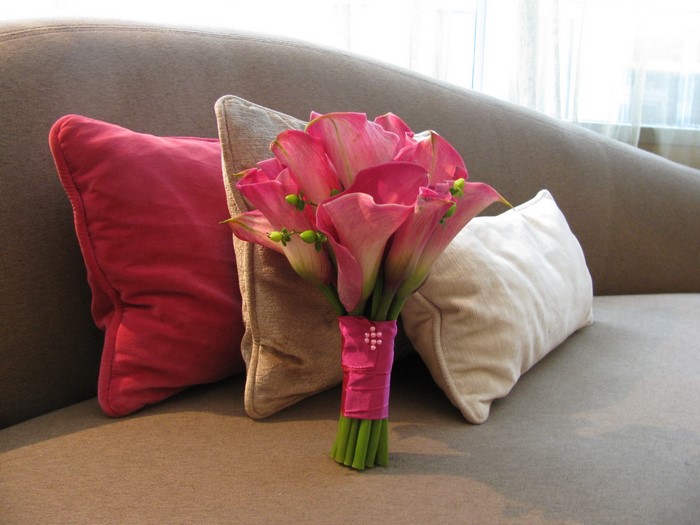 Pink Calla Lily Bouquet on a Sofa with Pillows