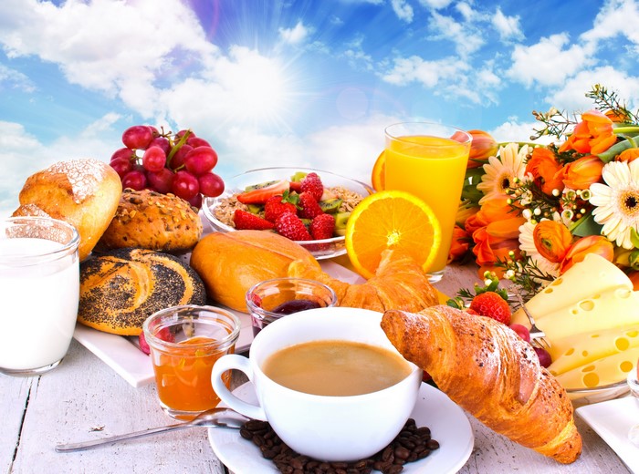 Breakfast Still-life with Coffee, Juice, and Pastries