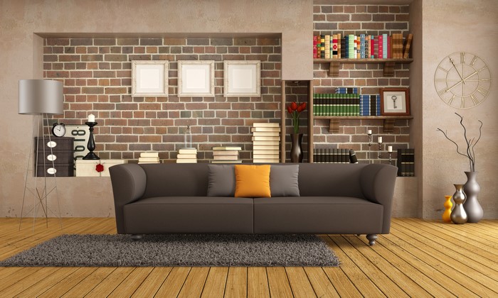 Living room with sofa and brick wall