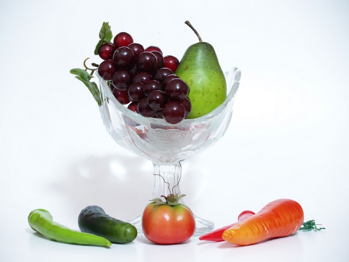 Fruit and vegetables in a glass bowl