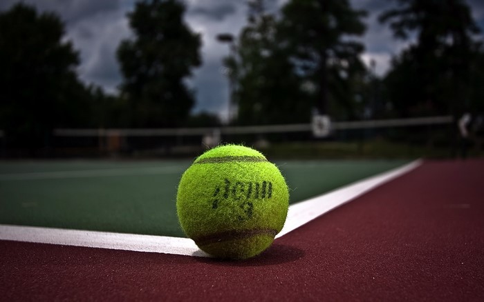 Tennis ball on a tennis court