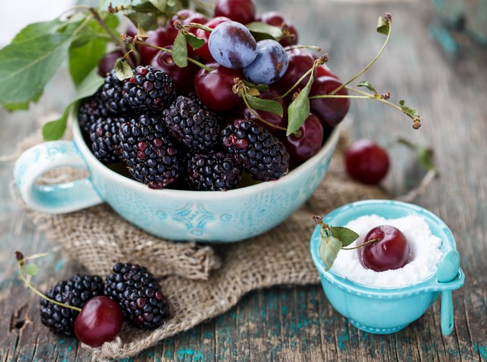 Blackberries, Cherries, and Plums in a Blue Cup