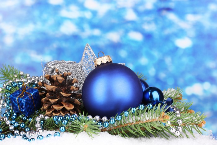 Christmas Decorations with Blue Ornaments and Pine Cone