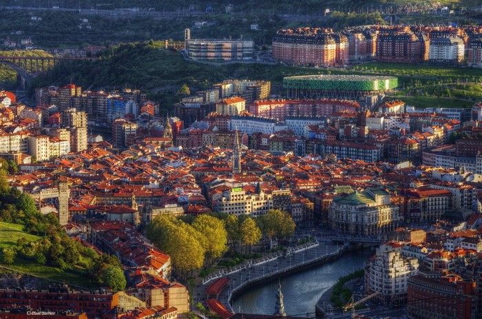 Bilbao, Spain cityscape with river and stadium