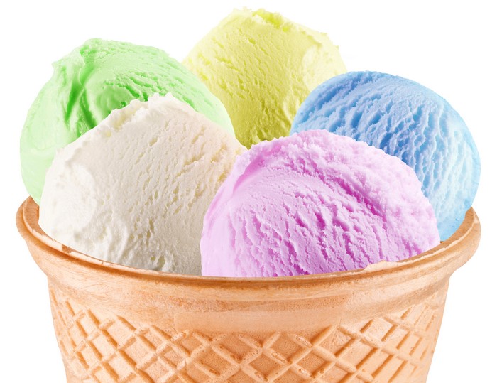 Multicolor ice cream scoops in a waffle cone
