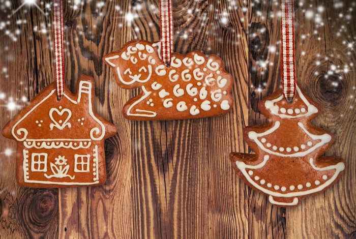 Christmas gingerbread cookies on wooden background