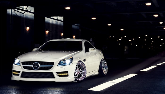 White Mercedes-Benz SLK in a dark tunnel