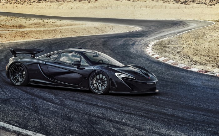 Black McLaren P1 on a Race Track